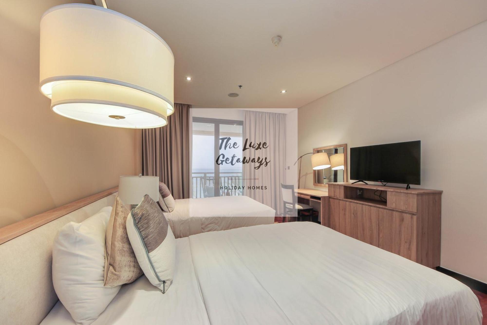 Luxe Getaways Royal Amwaj Palm Jumeirah Resort Apartment Holiday Home Dubaj Kültér fotó